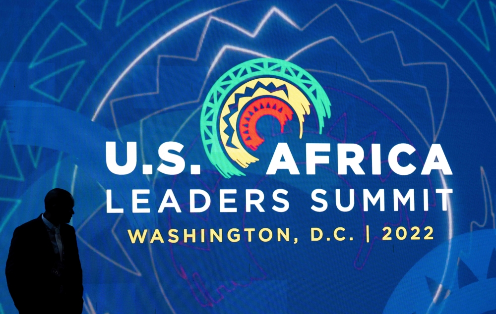 Attendees of the US - Africa Leaders Summit walk through the Walter E. Washington Convention Center, the site of the summit that brings together leaders from across Africa to meet with US President Joe Biden and other US representatives, in Washington, DC, on December 13, 2022. (Photo by SAUL LOEB / AFP)