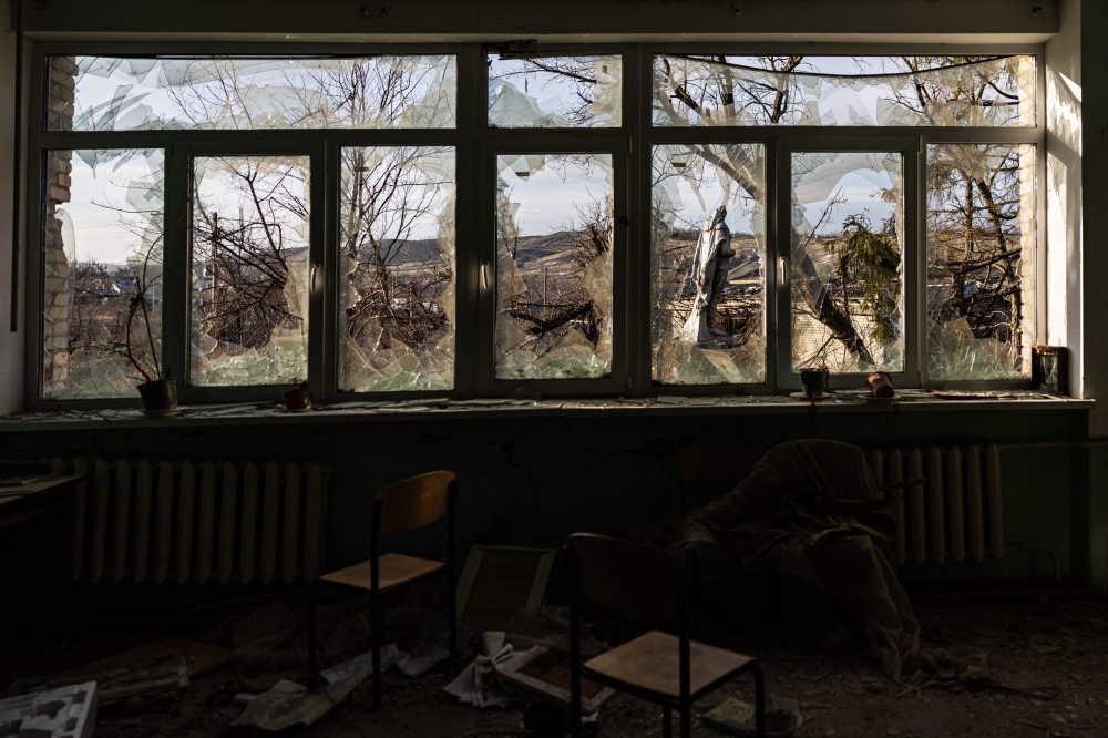 This photograph taken on December 20, 2022, shows destruction at a school in the village of Bohorodychne, eastern Ukraine. Photo by Sameer Al-DOUMY / AFP)