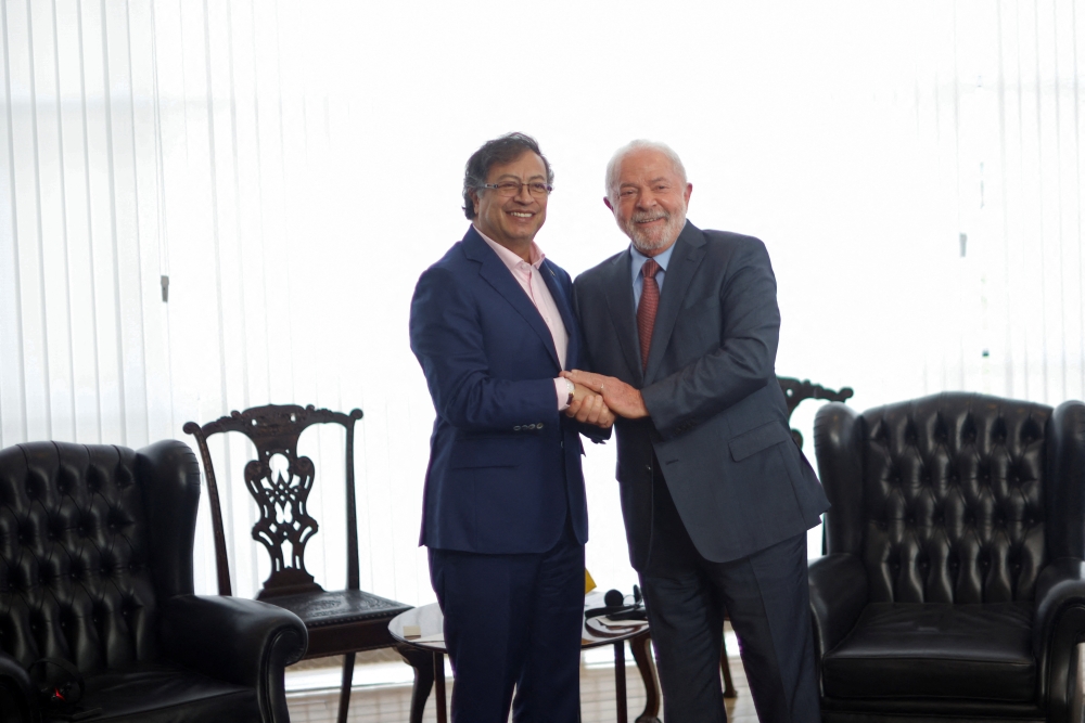 Brazil's President Luiz Inacio Lula da Silva holds hands with Colombian President Gustavo Petro during a bilateral meeting at the Itamaraty Palace in Brasilia, Brazil January 2, 2023. REUTERS/Adriano Machado