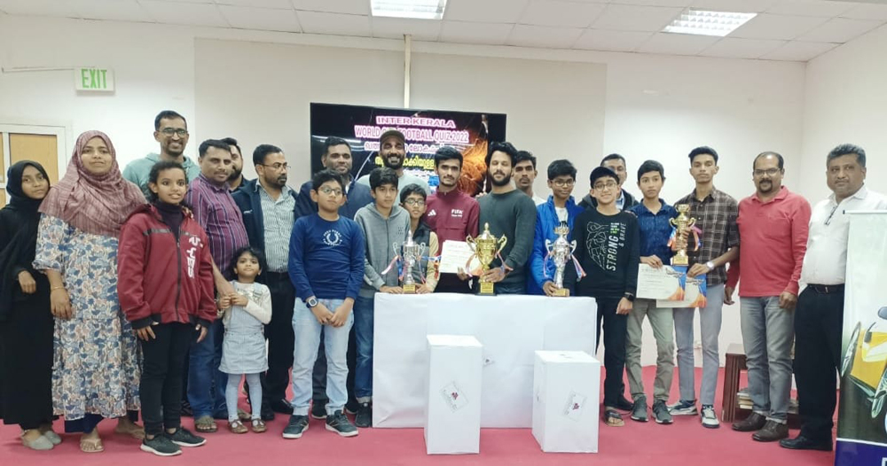 Winners of the Inter-Kerala Quiz Competition during the ceremony.