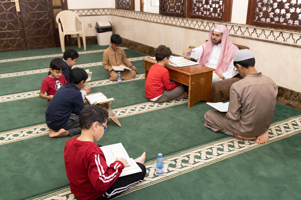 Students learning Quran at Dar Al Salam Holy Quran Learning Center in Abu Hamour