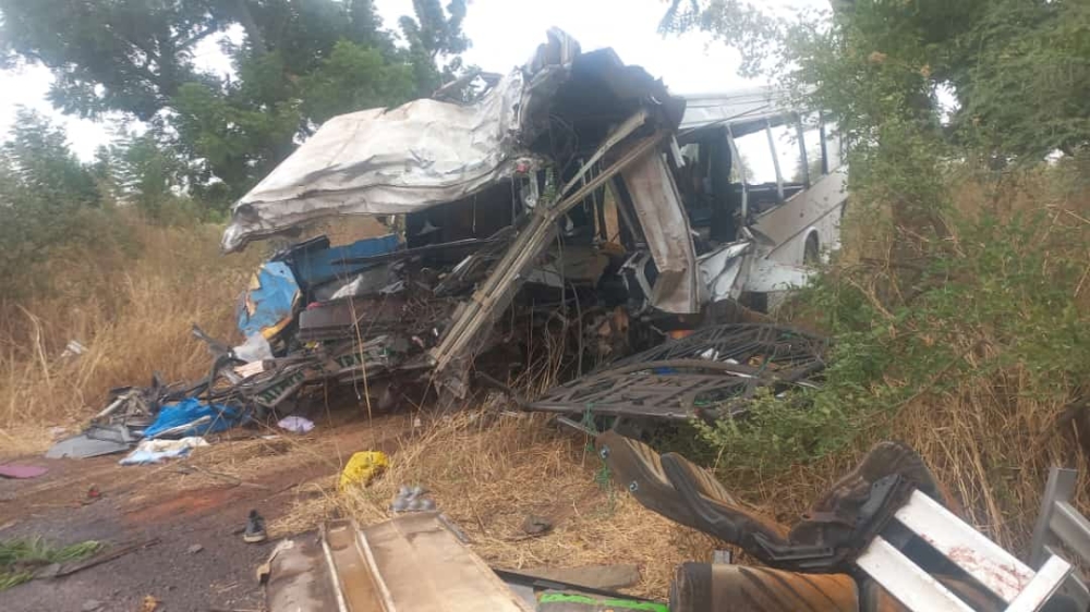 A general view of the scene of a bus accident in Kaffrine, central Senegal, on January 8, 2023 where at least 38 people have died and scores were injured when two buses collided. (Photo by Cheikh Dieng / AFP)