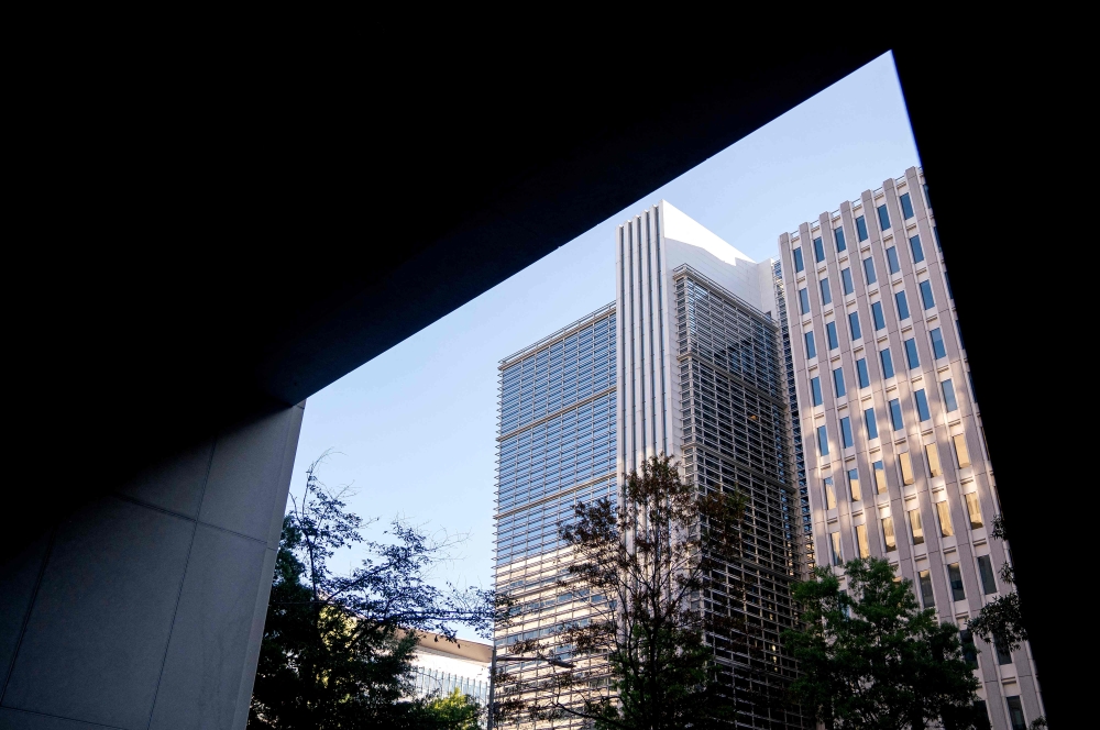 In this file photo taken on October 08, 2022, the World Bank headquarters seen from the International Monetary Fund headquarters in Washington, DC. (Photo by Stefani Reynolds / AFP)