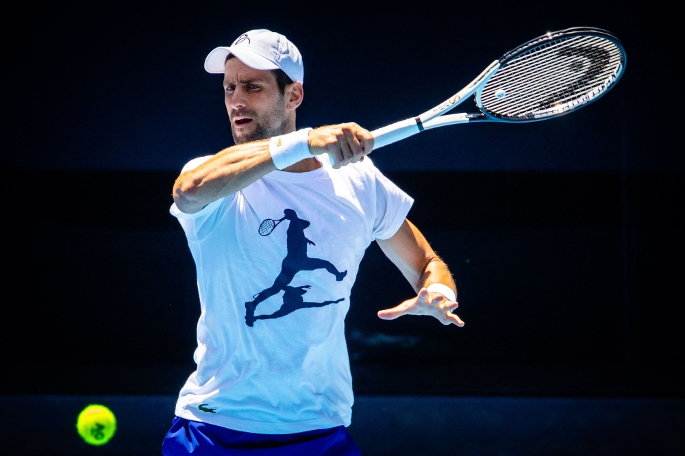 Serbia's Novak Djokovic attends a practice session ahead of the Australian Open tennis tournament in Melbourne on January 12, 2023. (Photo by Patrick HAMILTON / AFP)