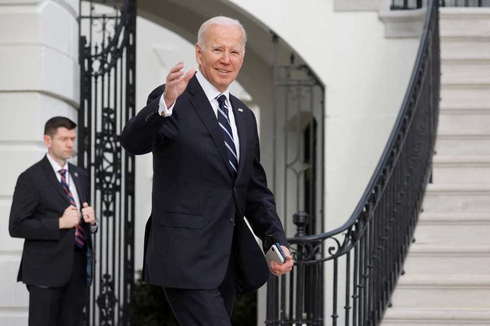 US President Joe Biden departs the White House to board the Marine One helicopter for travel to Delaware from the White House in Washington, US on January 13, 2023. REUTERS/Jonathan Ernst
