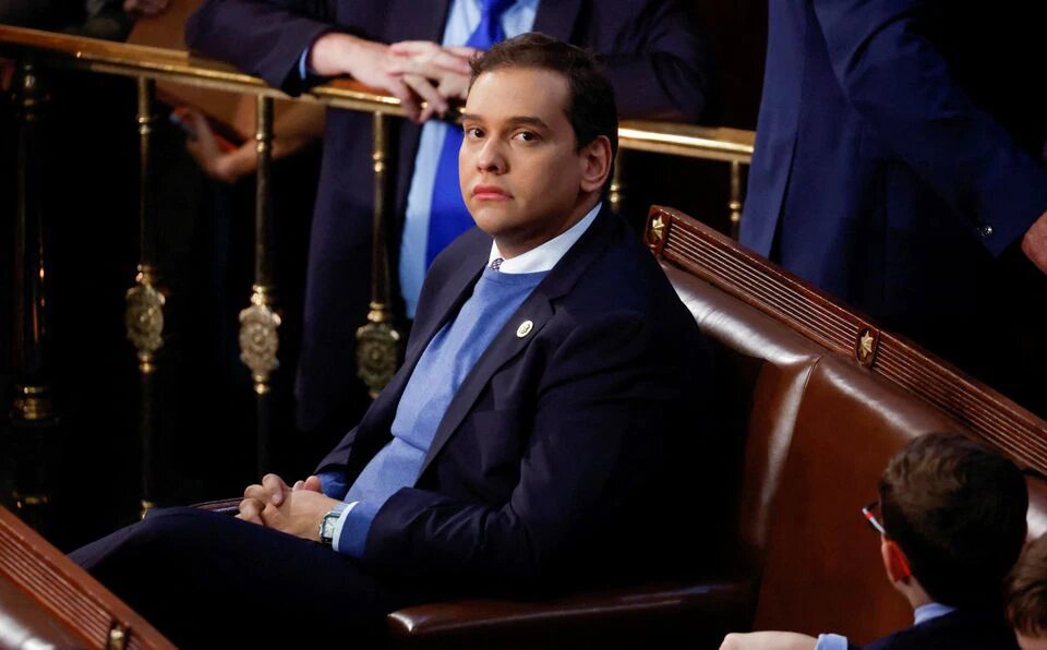 Newly elected freshman Rep. George Santos (R-NY), embroiled in a scandal over his resume and claims made on the campaign trail, sits alone in the House Chamber surrounded only by the children of other representatives, on the first day of the 118th Congress at the US Capitol in Washington, US, on January 3, 2023. File Photo / Reuters