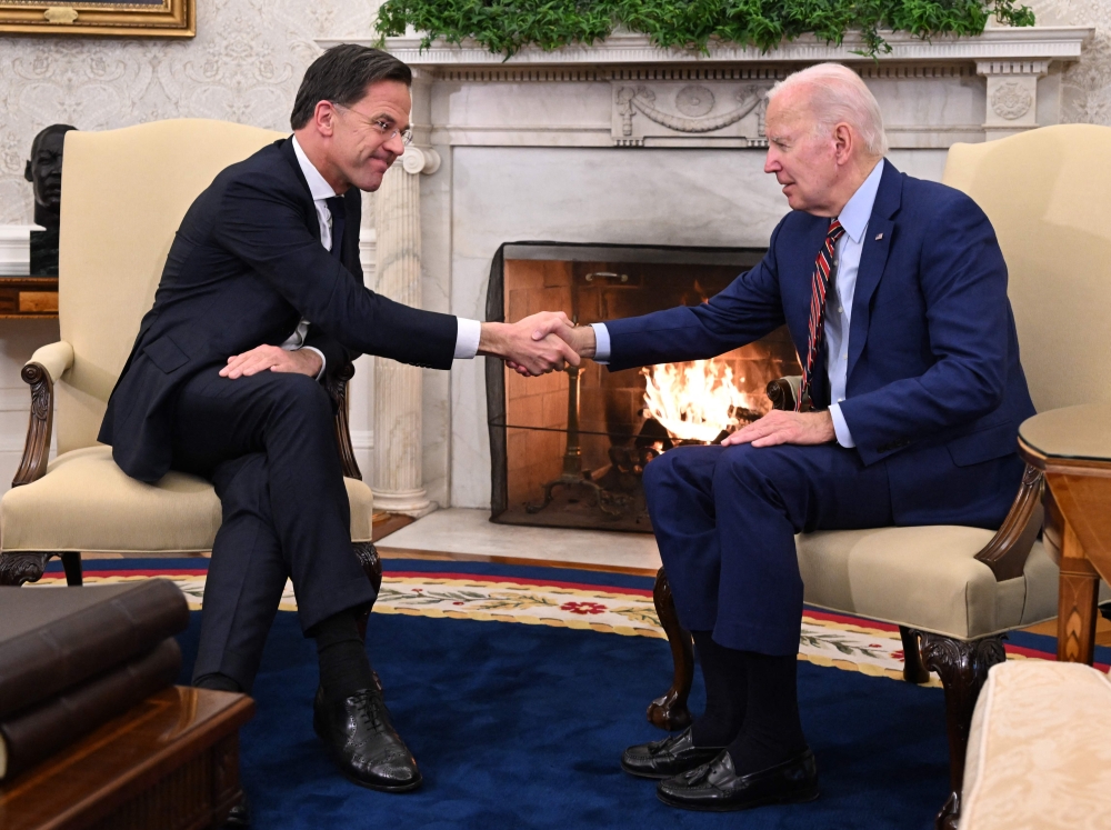 US President Joe Biden meets with Dutch Prime Minister Mark Rutte in the Oval Office of the White House in Washington, DC, on January 17, 2023. (Photo by Andrew Caballero-Reynolds / AFP)