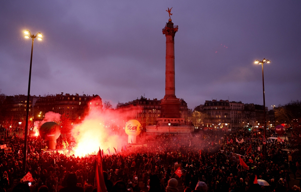 Demonstrators gather in Place de la Bastille during a rally called by French trade unions in Paris on January 19, 2023. (Photo by Thomas Samson / AFP)