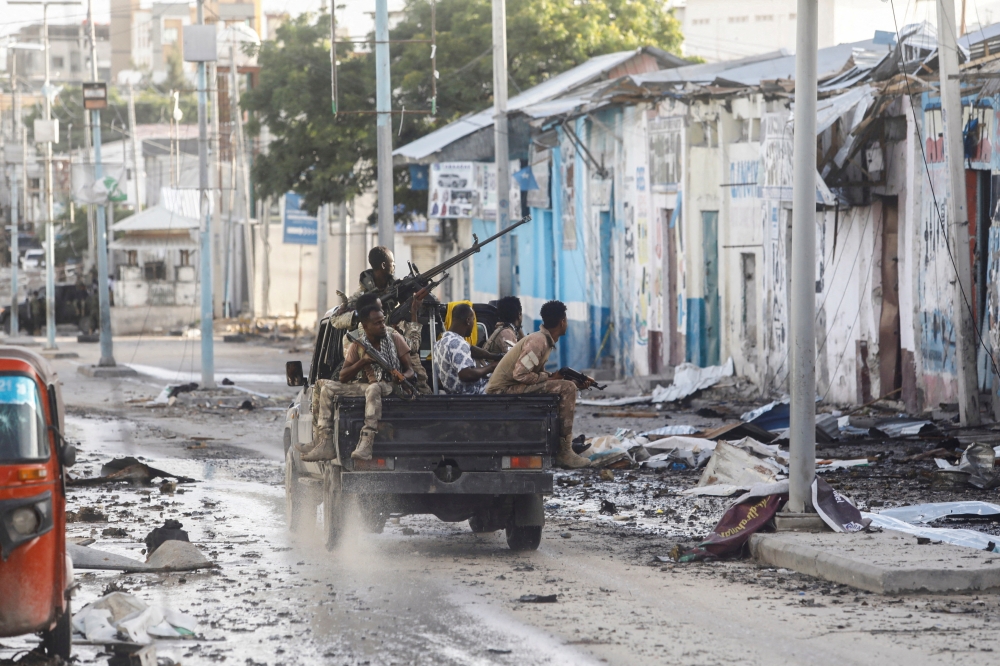 Somali security officers drive past a section of Hotel Hayat, the scene of an al Qaeda-linked al Shabaab group militant attack in Mogadishu, Somalia on August 20, 2022. File Photo / Reuters