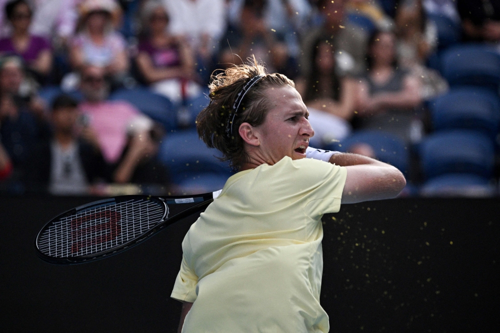 USA's Sebastian Korda reacts after winning against Poland's Hubert Hurkacz during their men's singles match on day seven of the Australian Open tennis tournament in Melbourne on January 22, 2023. (Photo by ANTHONY WALLACE / AFP)
