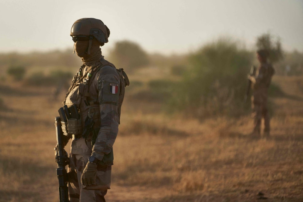 File photo: Soldiers monitor a rural area in northern Burkina Faso, along the border with Mali and Niger.(Photo by MICHELE CATTANI / AFP)

