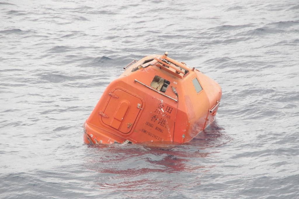 Thirteen crew rescued after ship sinks off Japan, search on for 9