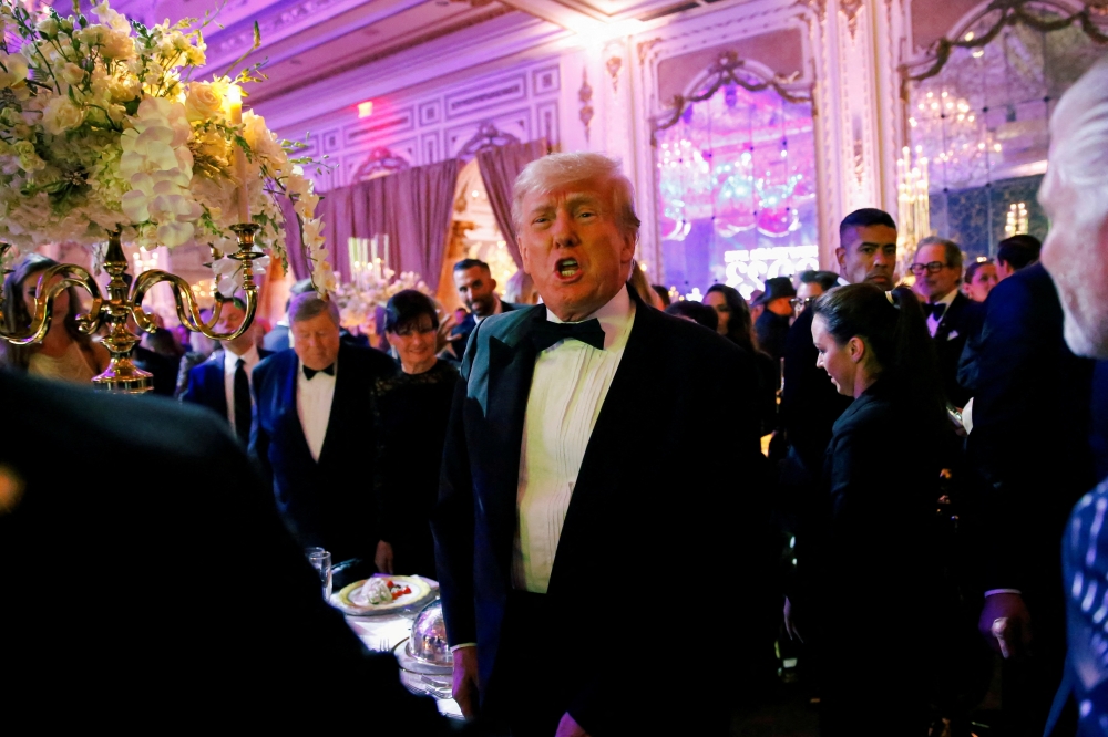 Former US President Donald Trump, who announced a third run for the presidency in 2024, hosts a New Year's Eve party at his Mar-a-Lago resort in Palm Beach, Florida, US on December 31, 2022. File Photo / Reuters