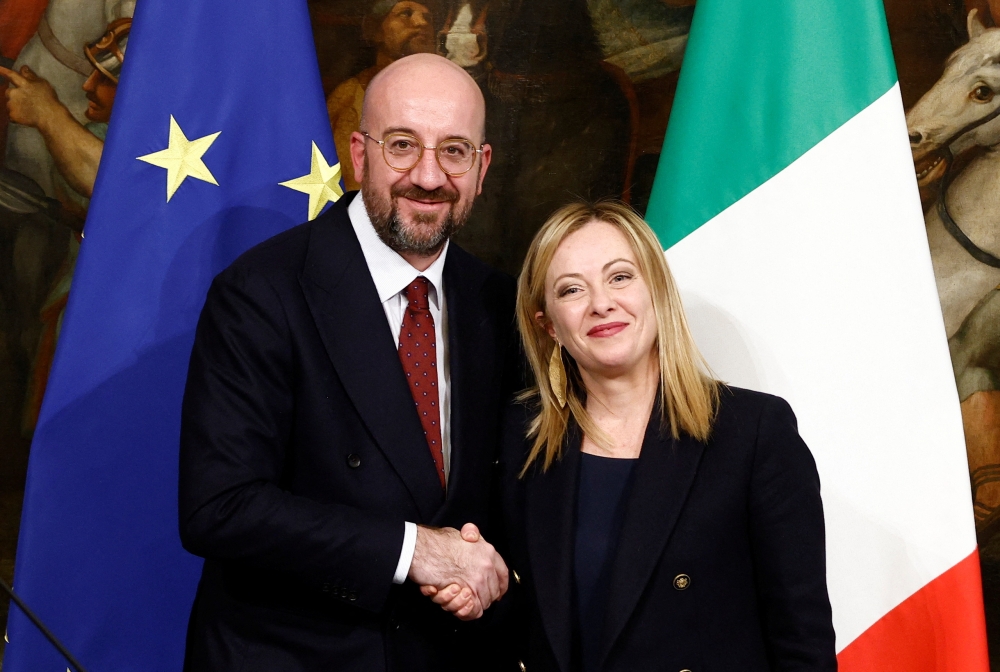 Italian Prime Minister Giorgia Meloni and European Council President Charles Michel pose for pictures during a news conference at Chigi Palace in Rome, Italy, on January 30, 2023. REUTERS/Guglielmo Mangiapane