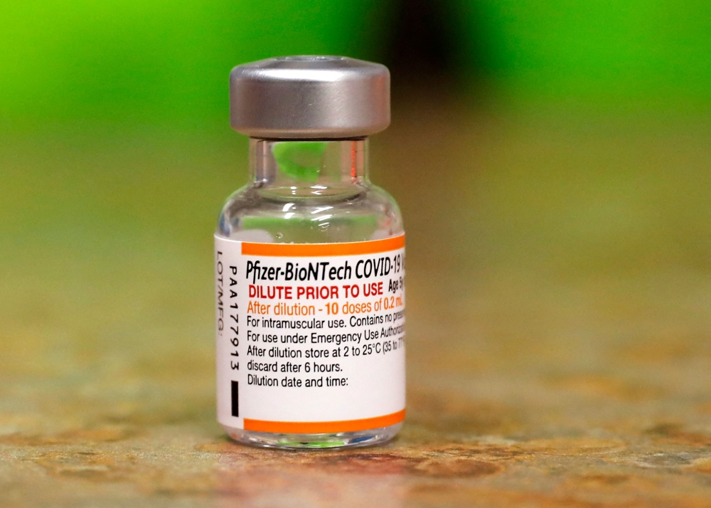 In this file photo taken on November 03, 2021, a vial of the Pfizer-BioNTech Covid-19 vaccine to be used for children aged 5 to 11 at the Child Health Associates office in Novi, Michigan. (Photo by Jeff Kowalsky / AFP)