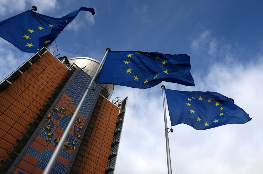 European Union flags flutter outside the EU Commission headquarters, in Brussels, Belgium, February 1, 2023. (REUTERS/Yves Herman)