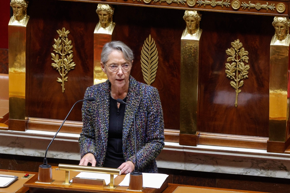 In this file photo taken on November 16, 2022, French Prime Minister Elisabeth Borne delivers a speech on France's energy policy as she attends the government's declaration session on France's energy policy followed by a debate at the National Assembly in Paris. (Photo by Geoffroy Van der Hasselt / AFP)