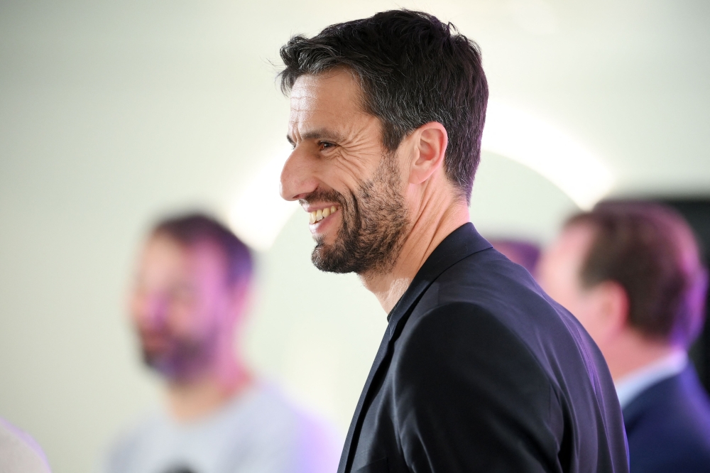 French President of the Paris Organising Committee of the 2024 Olympic and Paralympic Games Tony Estanguet reacts during the presentation of the pictograms of each discipline of Paris 2024 and Olympic and Paralympic Games, in Saint-Denis, north of Paris, on February 8, 2023.  (Photo by FRANCK FIFE / AFP)