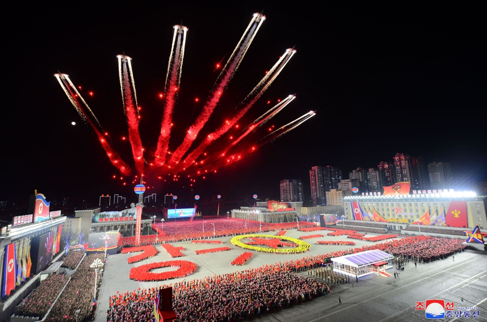 Jets flying past during a military parade celebrating the 75th anniversary of the founding of the Korean People's Army in Kim Il Sung Square in Pyongyang. (Photo by KCNA VIA KNS / AFP) 