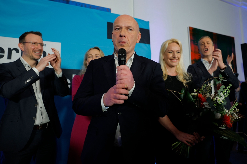 Christian Democratic Union (CDU) party's top candidate Kai Wegner delivers his speech after the first exit poll results for the Berlin state's repeat elections at the State parliament in Berlin on February 12, 2023. (Photo by Odd ANDERSEN / AFP)