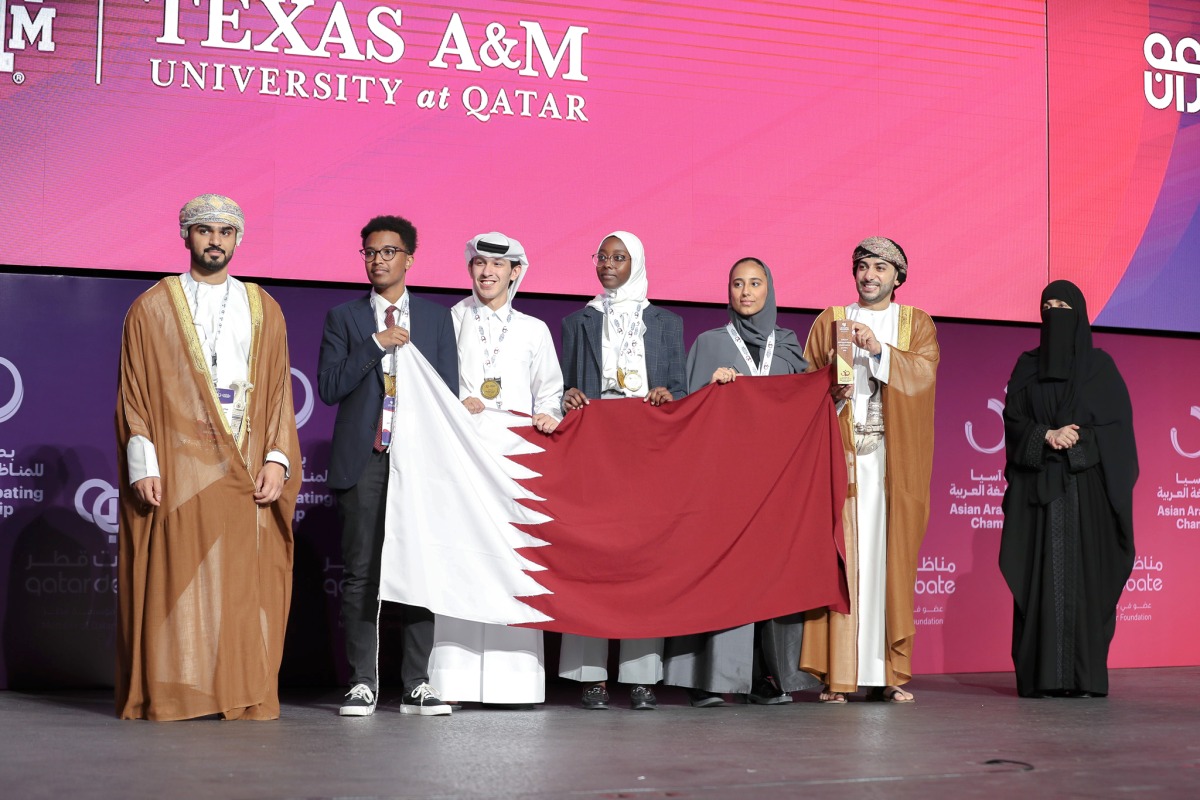 The members of the Texas A&M University at Qatar team with dignitaries following their victory.