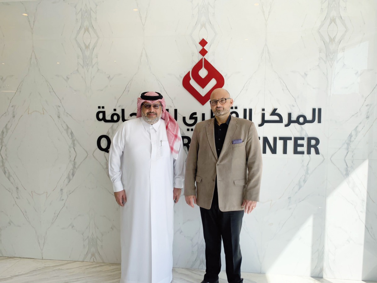 CEO of Qatar Press Center Faisal Al Mudhahka with the Dean and CEO of Northwestern University in Qatar Marwan Kraidy.