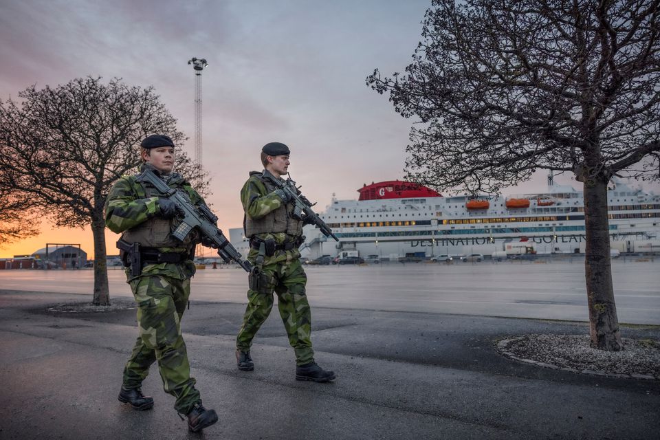 File Photo: Soldiers from Gotland's regiment patrol Visby harbour, amid increased tensions between NATO and Russia over Ukraine, on the Swedish island of Gotland, Sweden, 13 January 2022. (TT News Agency/Karl Melander via REUTERS)
