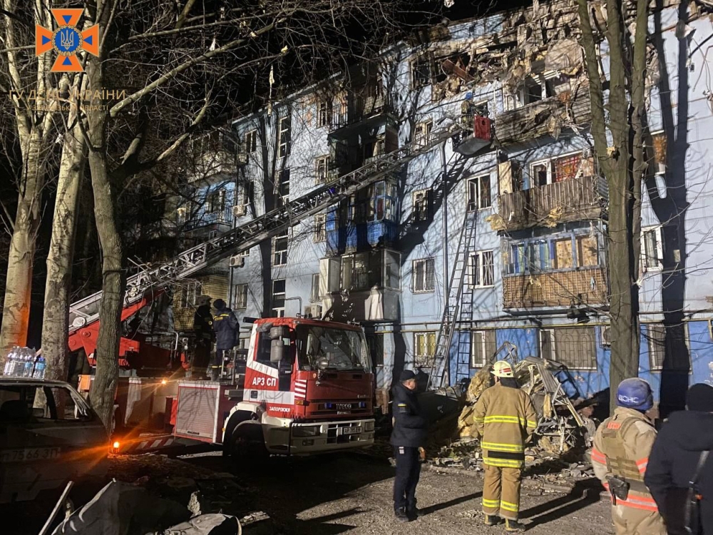 This handout picture taken and released by the Ukrainian Emergency Ministry press service on March 2, 2023, shows rescuers work on a residential building destroyed after a missile strike, in Zaporizhzhia, amid the Russian invasion of Ukraine. Photo by Handout / UKRAINE EMERGENCY MINISTRY PRESS SERVICE / AFP