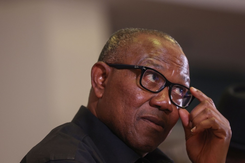 Nigeria Labour Party Presidential Candidate, Peter Obi, adjust his glasses during a press briefing on the outcome of the 2023 Nigeria presidential and general election in Abuja on March 2, 2023. (Photo by KOLA SULAIMON / AFP)