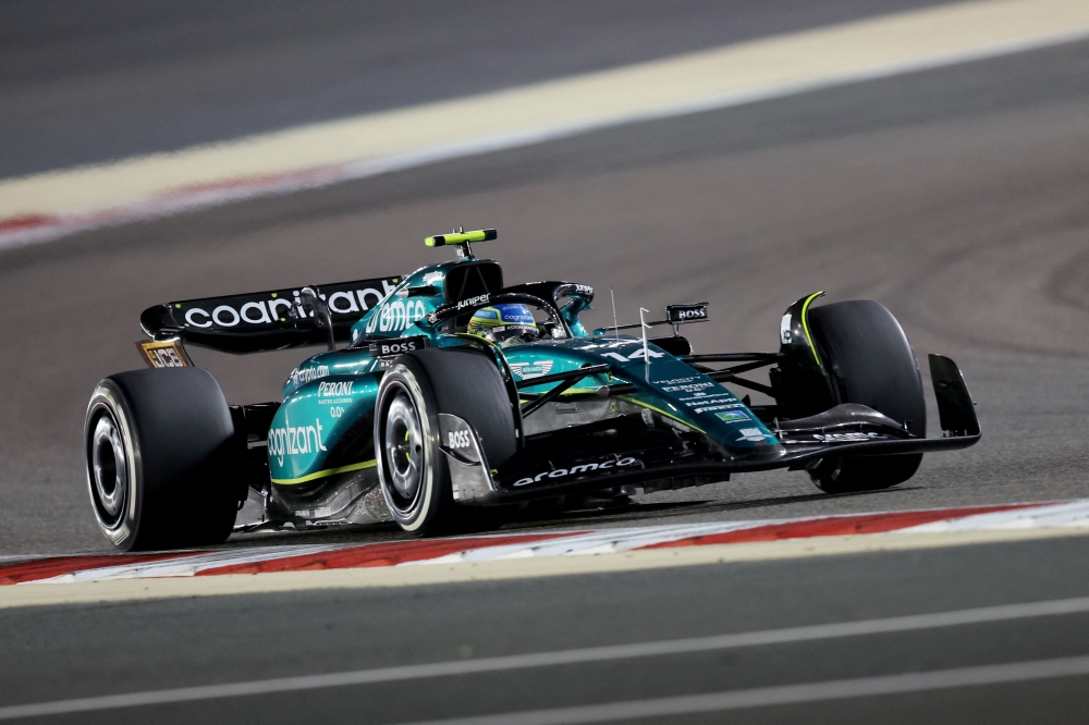 Aston Martin's Spanish driver Fernando Alonso competes during the Bahrain Formula One Grand Prix at the Bahrain International Circuit in Sakhir on March 5, 2023. (Photo by Giuseppe CACACE / AFP)
