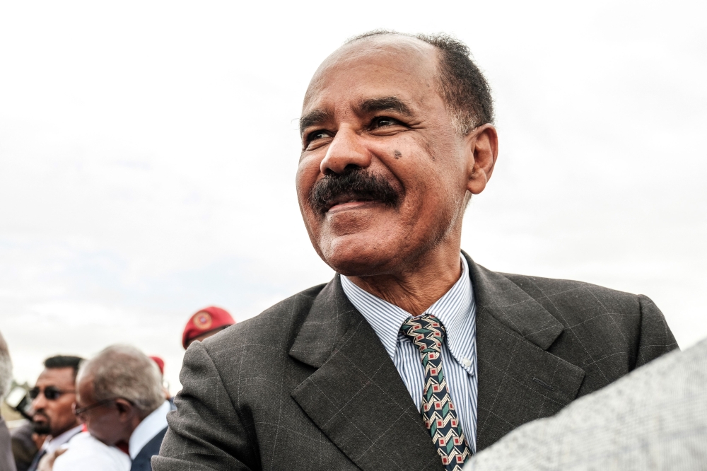 (FILE PHOTO) In this file photo taken on November 09, 2018 Eritrea's President Isaias Afwerki smiles upon his arrival at the airport in Gondar, for a visit in Ethiopia. (Photo by EDUARDO SOTERAS / AFP)
