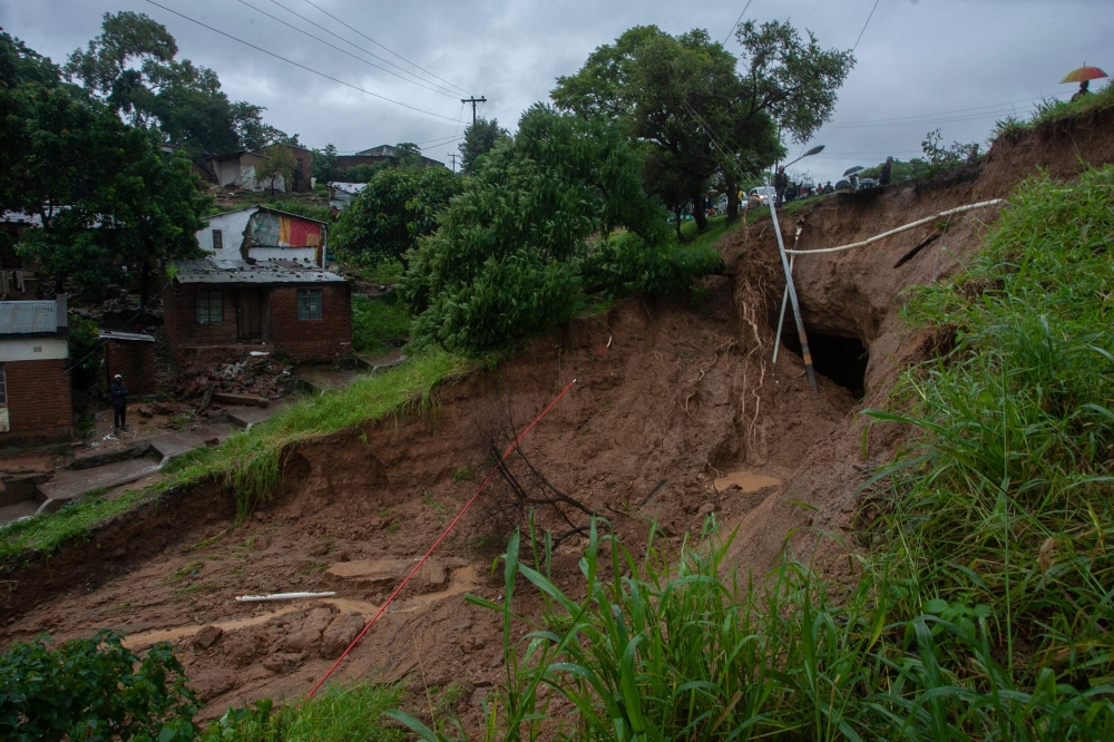 A general view of a landslide at Mbayani in Blantyre, on March 13, 2023, due to heavy rains following the effects of cyclone Freddy. - Malawi's leader on March 13, 2023 declared a state-of-disaster in several southern districts including the commercial hub Blantyre after the powerful cyclone Freddy made a come-back killing dozens. (Photo by Amos Gumulira / AFP)