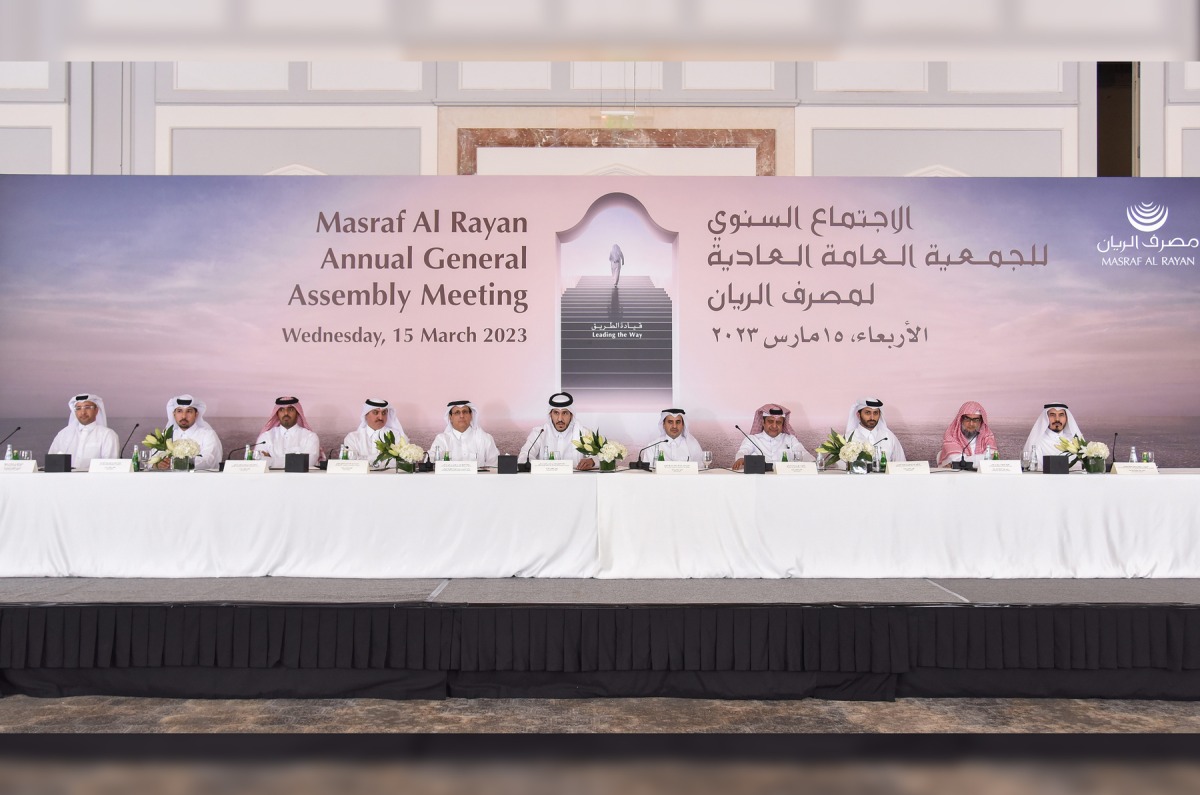 Minister of Commerce and Industry and Chairman of the Board of Directors H E Sheikh Mohamed Bin Hamad Bin Qassim Al Thani with officials of Masraf Al Rayan at the AGM. 