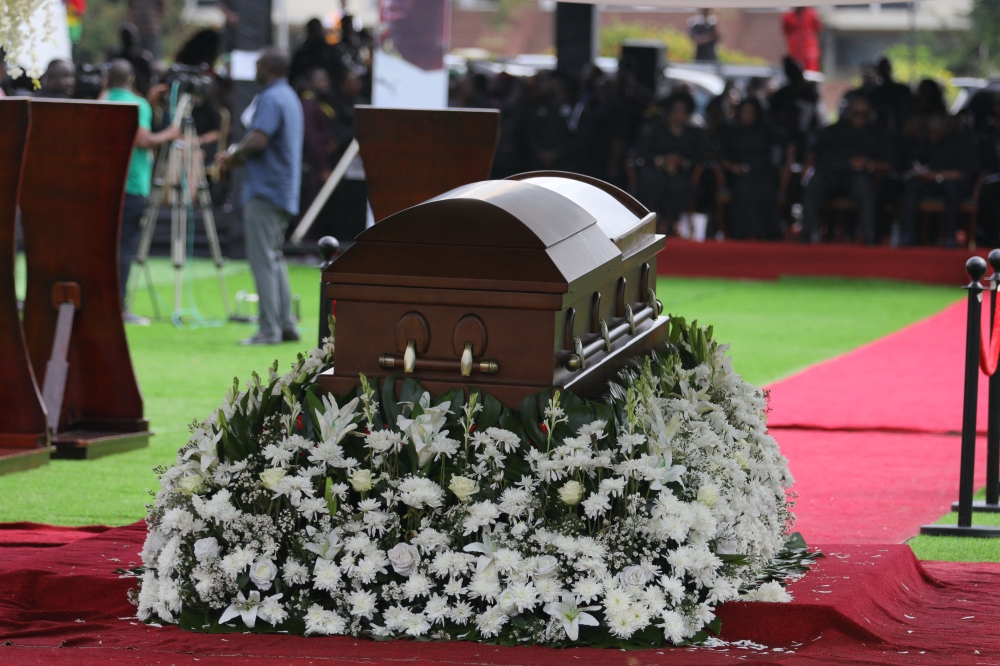 The coffin of former Ghanaian footballer Christian Atsu is seen during his funeral at the State House in Accra, Ghana, on March 17, 2023. - Atsu, 31, was caught up in a 7.8-magnitude quake that rocked Turkey and Syria on February 6, 2023 killing more than 44,000 people in both countries. (Photo by Nipah Dennis / AFP)