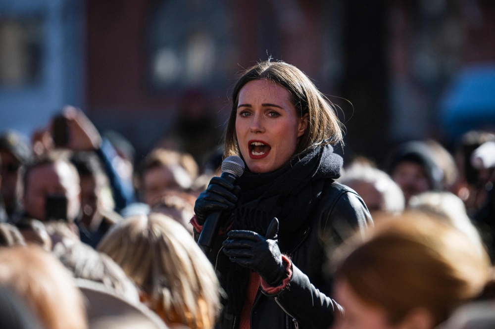 Social Democratic Party SDP chair and Finnish Prime Minister Sanna Marin addresses supporters during her elections rally in Helsinki on April 1, 2023, one day ahead of the Finnish parliamentary elections. (Photo by Jonathan Nackstrands  / AFP)