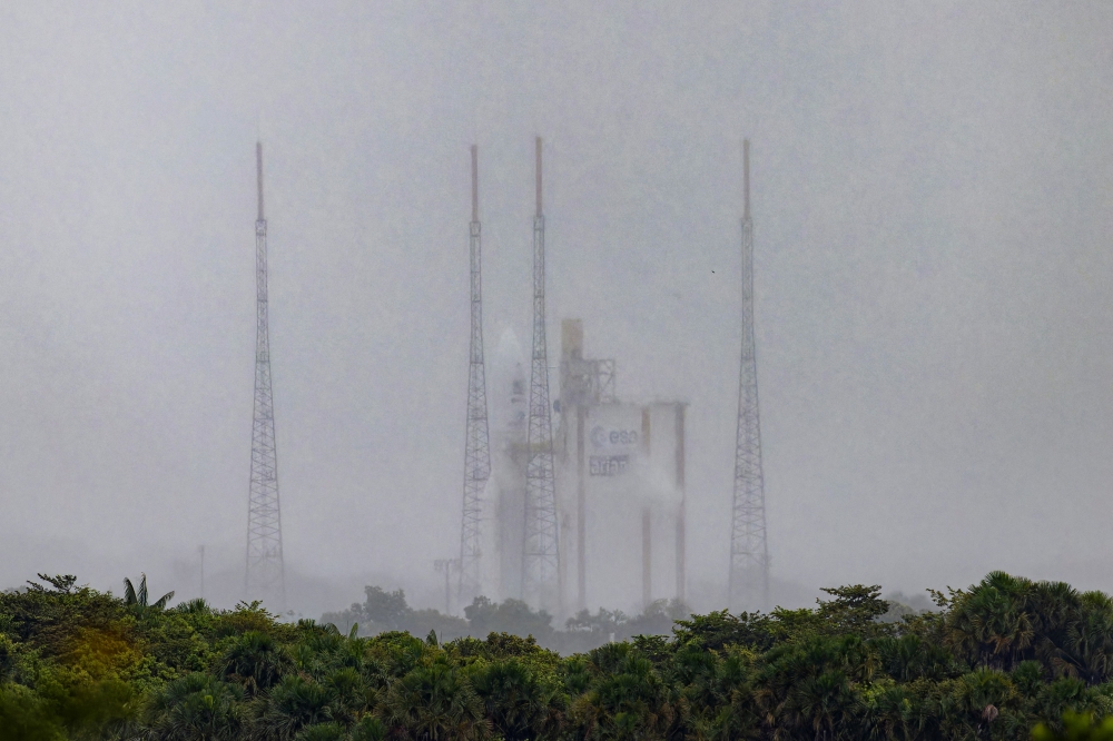 This photograph taken on April 13, 2023, shows Arianespace's Ariane 5 rocket with the interplanetary spacecraft JUICE (Jupiter Icy Moons Explorer) onboard, on its launchpad at the Guiana Space Center in Kourou, French Guiana. Photo by jody amiet / AFP