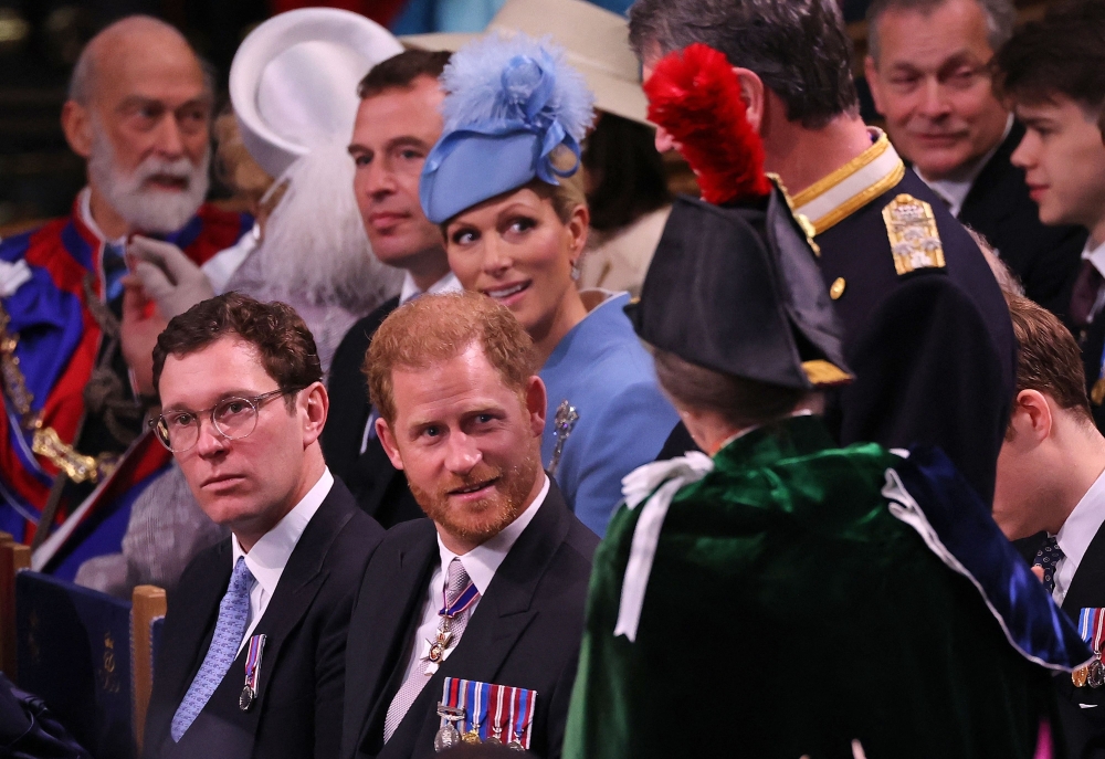 Britain's Prince Harry, Duke of Sussex talks to Britain's Princess Anne, Princess Royal at Westminster Abbey in central London on May 6, 2023. (Photo by Richard Pohle / Pool / AFP)