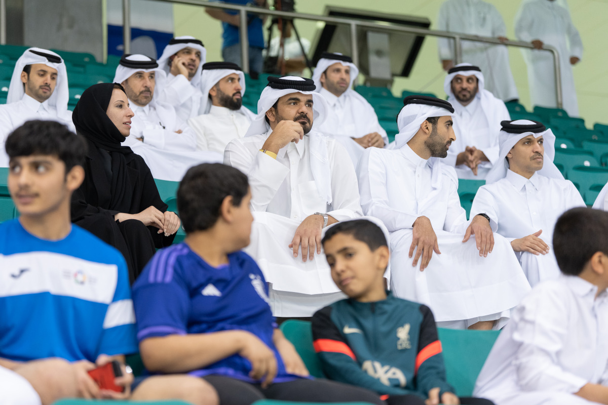 QOC President H E Sheikh Joaan bin Hamad Al Thani, Minister of Education and Higher Education 
 H E Buthaina bint Ali Al Jabr Al Nuaimi and QOC Secretary General Jassim Rashid Al Buenain along with other officials attending Schools Olympic Program competitions at Aspire Dome yesterday. 