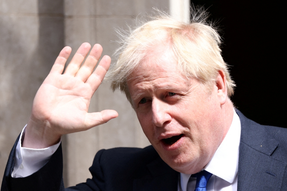 File Photo: Former British prime minister Boris Johnson walks at Downing Street in London, Britain, July 6, 2022. (Reuters)