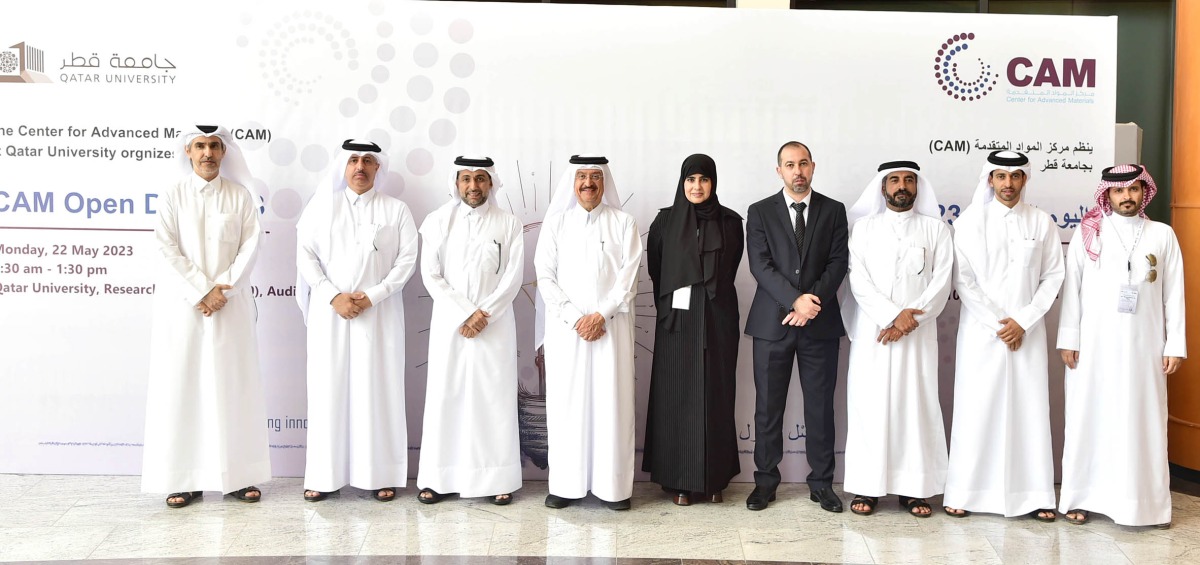 QU President Dr. Hassan Al Derham (third left); Vice-President for Research and Graduate Studies Prof. Mariam Al Maadeed (centre); and other officials at QU-CAM open day activities.