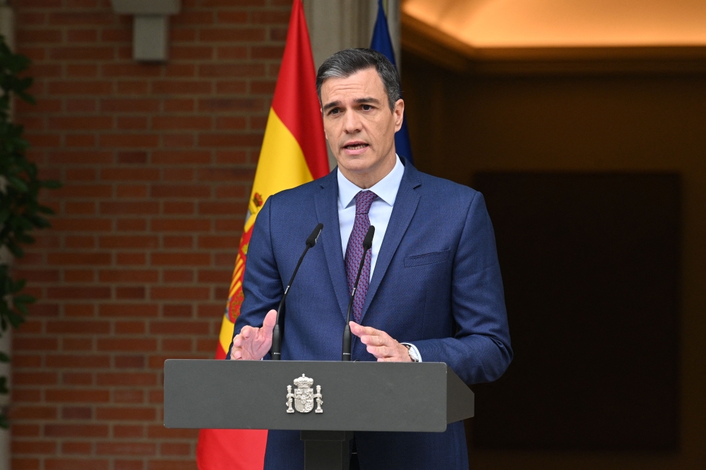 In this handout image made available by La Moncloa on May 29, 2023 Spanish Prime Minister Pedro Sanchez speaks at La Moncloa Palace in Madrid as he called a snap election in July. (Photo by Borja Puig de la Bellacasa / LA MONCLOA / AFP) 
