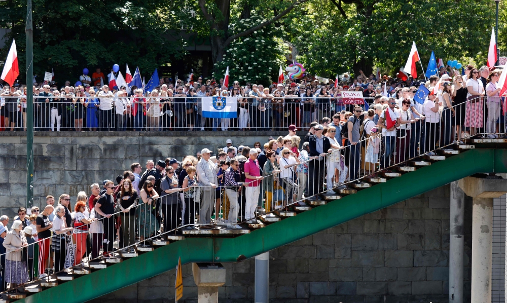 People attend an anti-government demonstration organized by the opposition in Warsaw on June 4, 2023. (Photo by Wojtek Radwanski / AFP)
