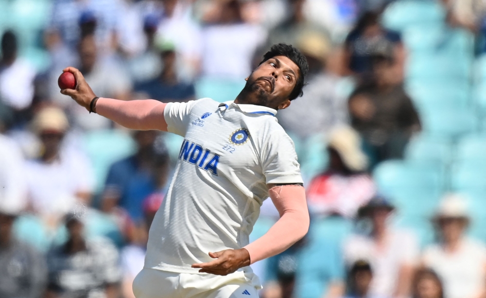 India's Umesh Yadav delivers a ball during play on day 4 of the ICC World Test Championship cricket final match between Australia and India at The Oval, in London, on June 10, 2023. (Photo by Glyn Kirk / AFP)