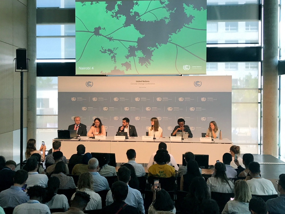Swedish climate activist Greta Thunberg (right), Climate justice organizer from Kenya, Eric Njuguna (3rd left) and other participants address a press conference of youth activists, scientists and negotiators who call for an equitable fossil fuel phase out, in Bonn, western Germany on June 13, 2023. (Photo by Andre Pain / AFP)