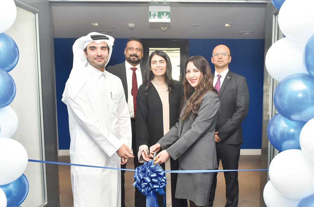 Officials from Qatar Central Bank, US Embassy in Qatar, and VISA during the ribbon cutting ceremony held yesterday in Tornado Tower. PIC: ABDUL BASIT/THE PENINSULA.