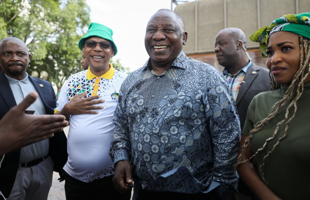 File photo: South African President Cyril Ramaphosa speaks to members of the media after attending the African National Congress (ANC) National Working Committee meeting in Johannesburg, South Africa, December 4, 2022. REUTERS/Sumaya Hisham