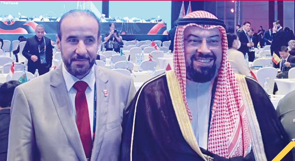 QOC Second Vice President Dr Thani bin Abdulrahman Al Kuwari poses with OCA President Sheikh Talal Al Fahad Al Sabah (right) during the 42nd OCA General Assembly in Bangkok yesterday.  