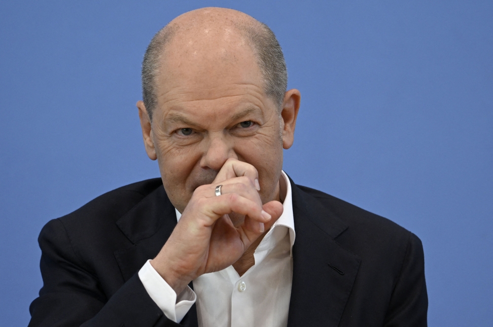 German Chancellor Olaf Scholz addresses a summer press conference on domestic policy and diplomacy in Berlin on July 14, 2023. (Photo by Tobias SCHWARZ / AFP)
