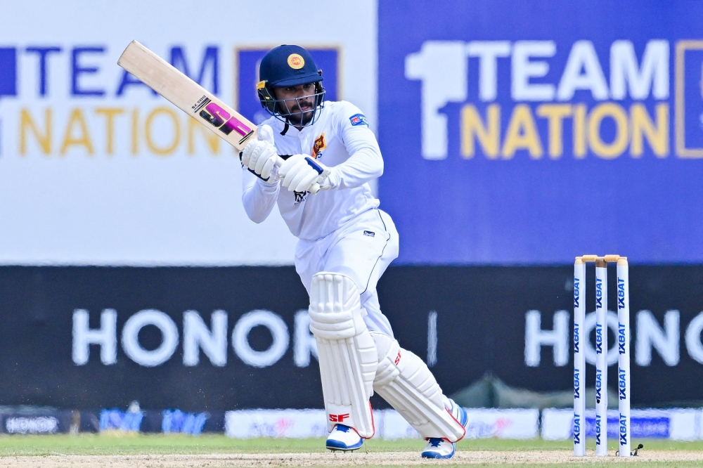 Sri Lanka's Dhananjaya de Silva plays a shot during the first day of the first cricket Test match between Sri Lanka and Pakistan at the Galle International Cricket Stadium in Galle on July 16, 2023. (Photo by Ishara S. KODIKARA / AFP)