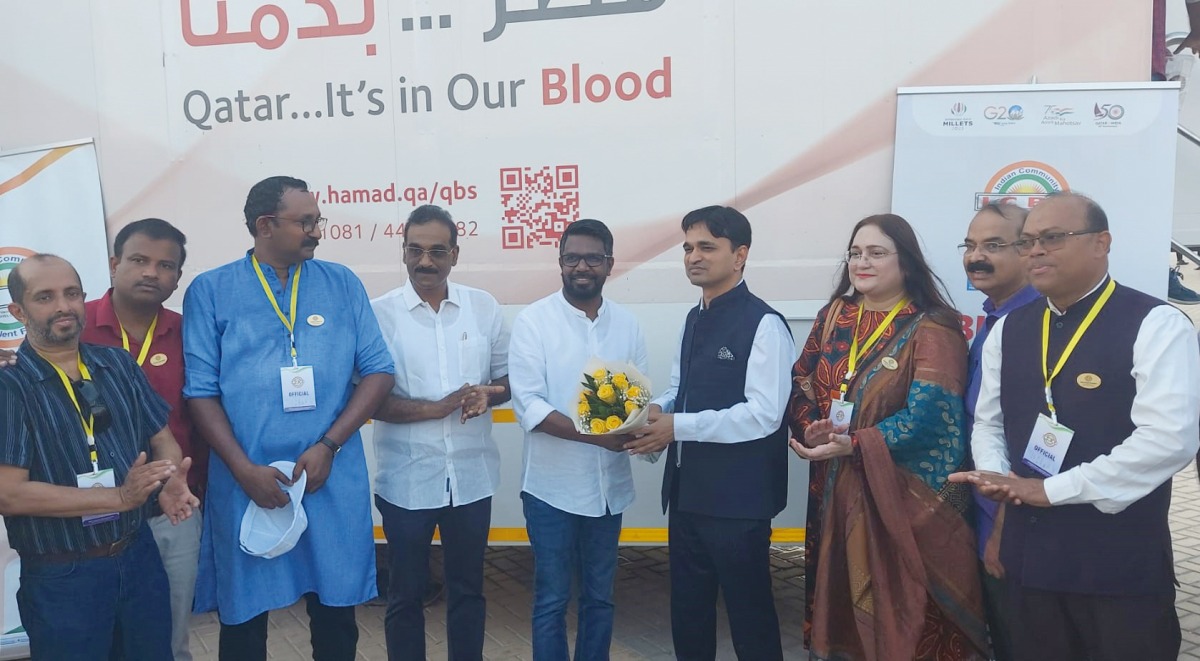 Officials and community representatives at the blood donation event. 